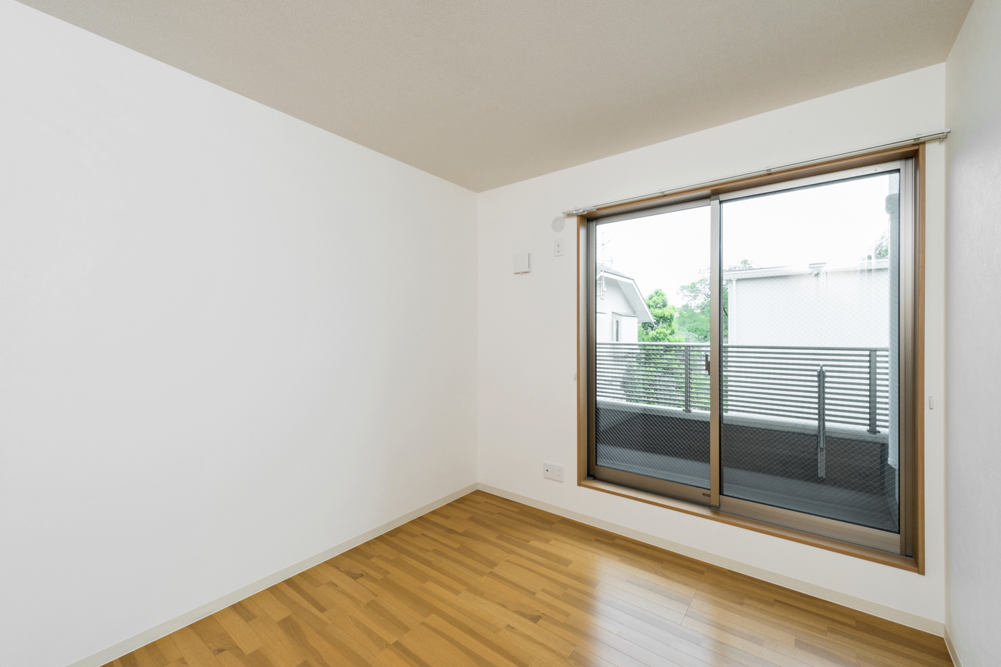 名古屋市天白区の戸建賃貸住宅のベランダが付いた洋室