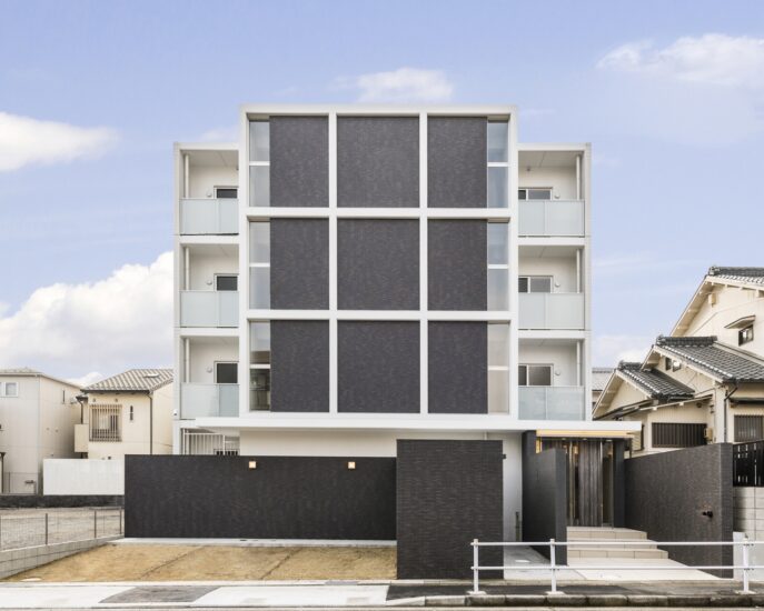 名古屋市名東区の4階建ての賃貸マンションのモノトーン調のモダンなデザインの賃貸マンション写真