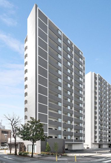 名古屋市東区の賃貸マンションのモダンな外観デザインの2棟の15階建て賃貸マンションの新築写真