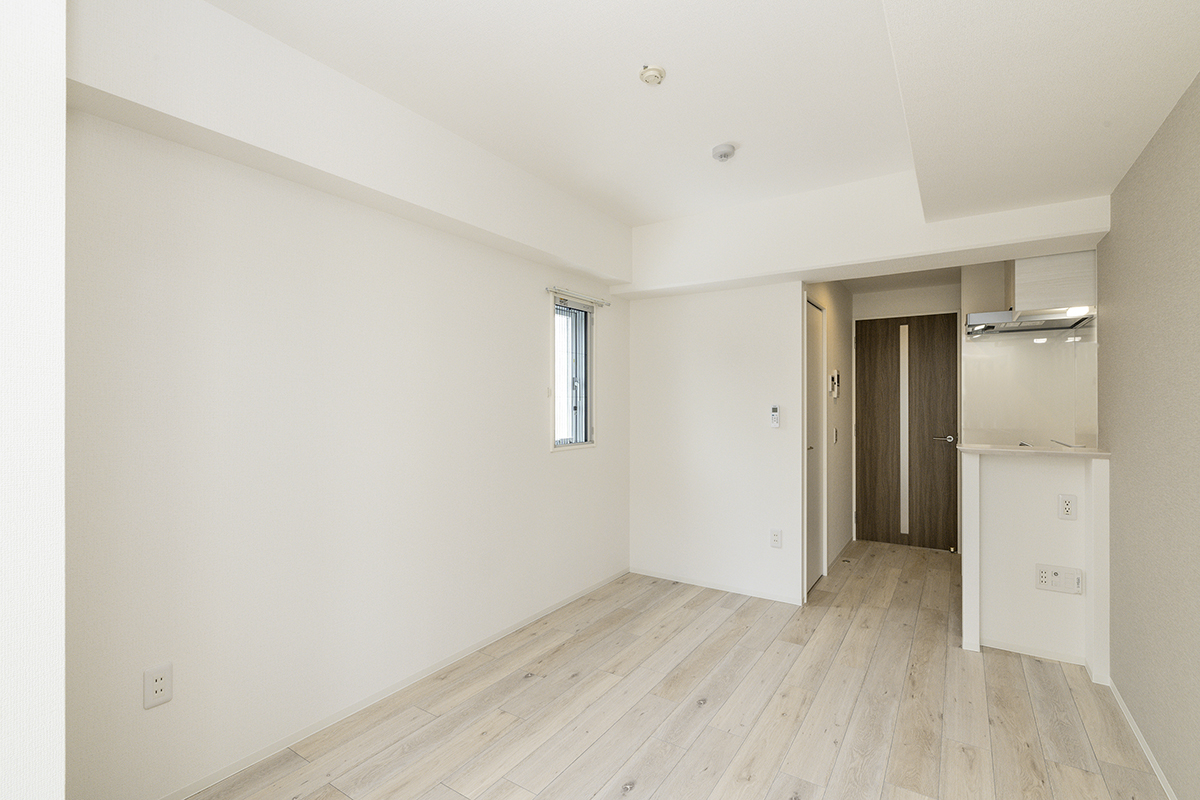 名古屋市中区の賃貸マンションの白を基調としたシンプルなミニキッチン付き洋室