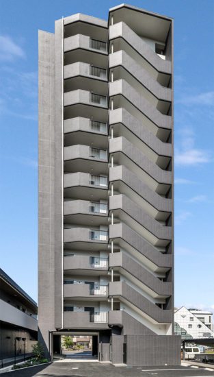 愛知県豊田市の12階建ての賃貸マンションのダークトーンの外観デザイン