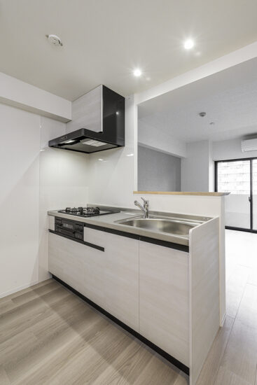 名古屋市中区の駅近・約70坪の土地の店舗付き賃貸マンション:Aタイプ:3口コンログリル付きのオープンキッチン